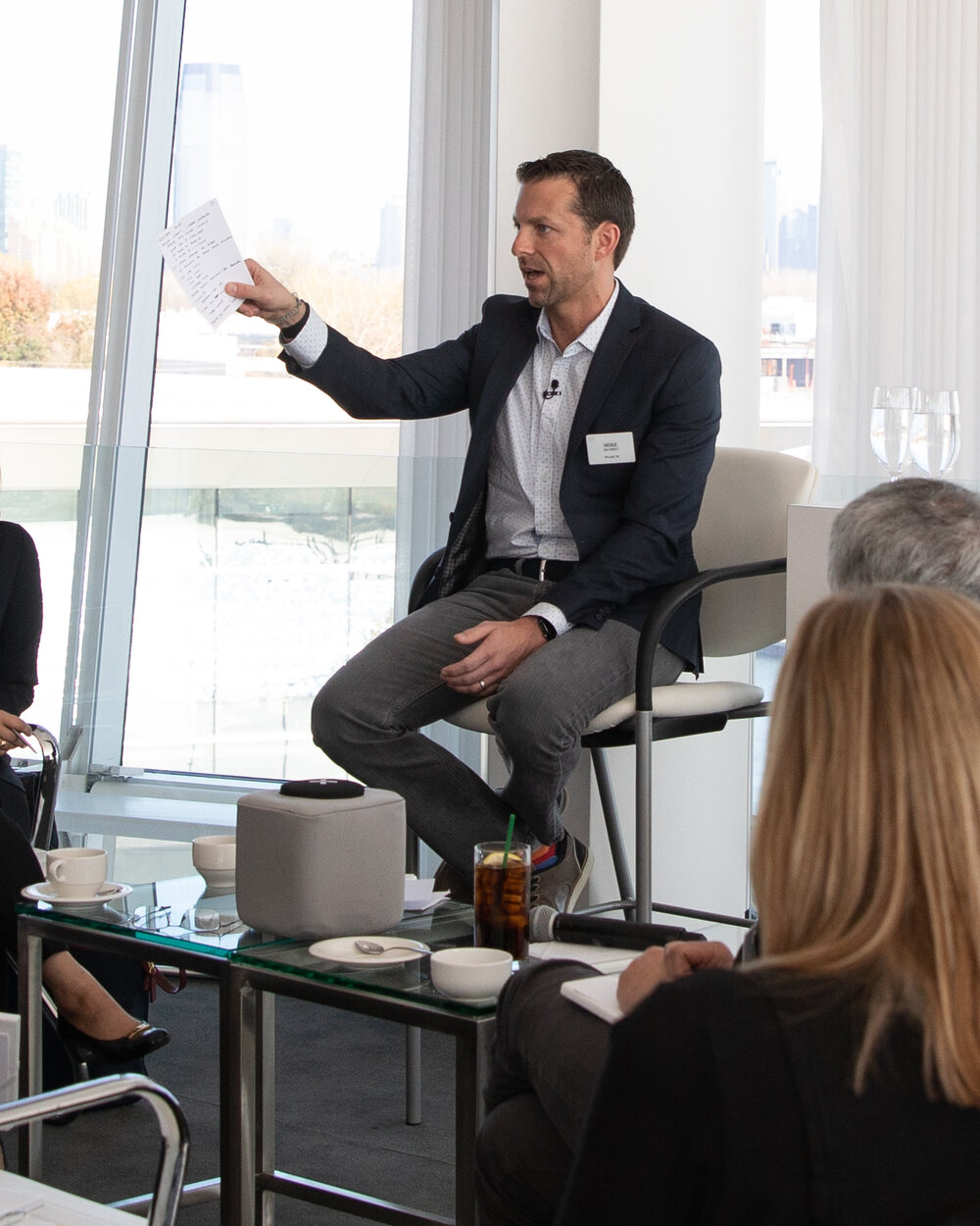 Mike Mudrey in conversation at an executive gathering
